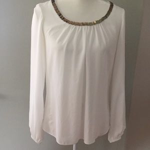 Tova gold trimmed scoop neck long sleeve blouse.